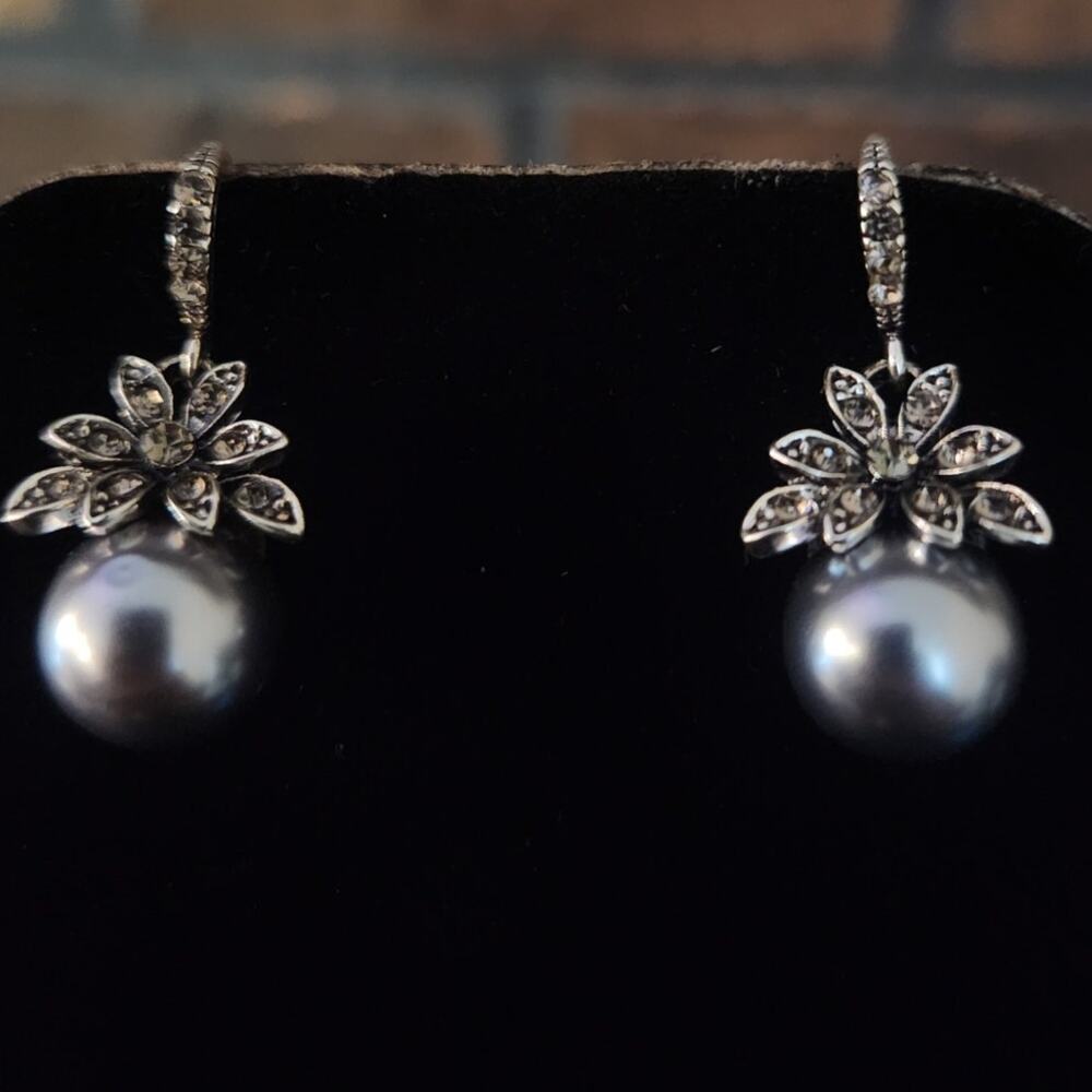 Silver Tone Dangle Earrings With Faux Pearl in Silver Color Under a Flower